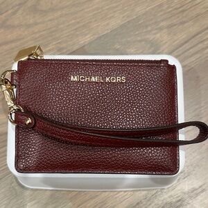 Michael Kors Deep Red Wristlet with Gold Accents